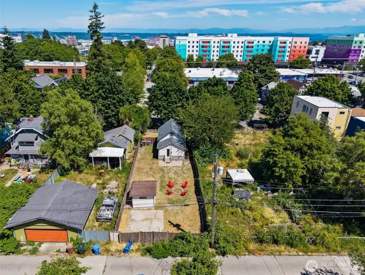 Huge, deep lot offers room for expansion! Think additional dwelling, shop/garage or a shop with an apartment above!