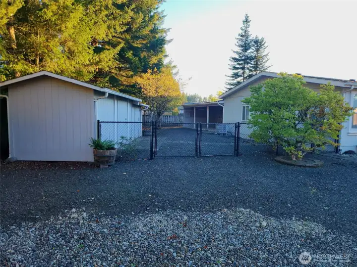 Large gated entrance to backyard