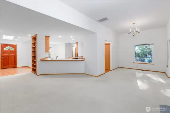 Spacious living area with natural light and comfortable layout