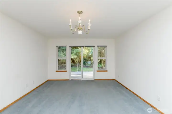 Primary bedroom with peaceful outlook and generous closet space