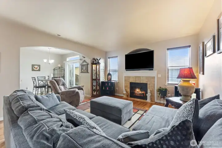 Enter into the cozy living room complete with propane fireplace.