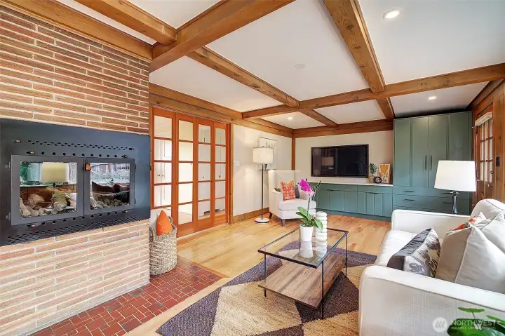 Wrap around fireplace for both rooms to enjoy its ambiance. New builtin cabinets for more storage.