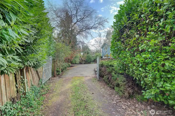 Short alley to the private entrance to this home's backyard. Plenty of parking for that RV if needed.