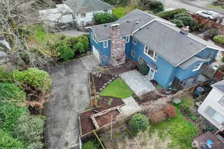 View of rear yard and entrance. Plenty of off street parking and privacy.