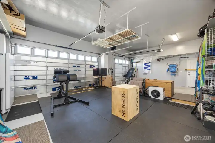 3 bay Garage with Plug for Electric Car Charging.