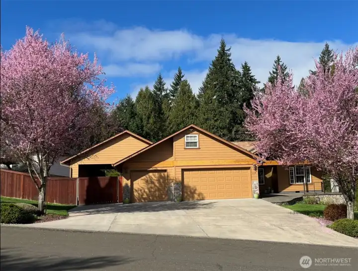 5 Car Garage, Carport and Extended Driveway too