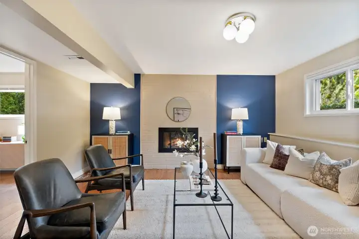 Take the chill off in the winter with the fireplace and stay cool in the summer in the inviting family room. Secondary bedroom to the left.