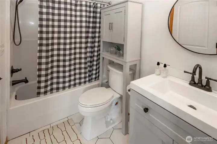 Primary/Shared full bathroom upstairs *Virtually staged*