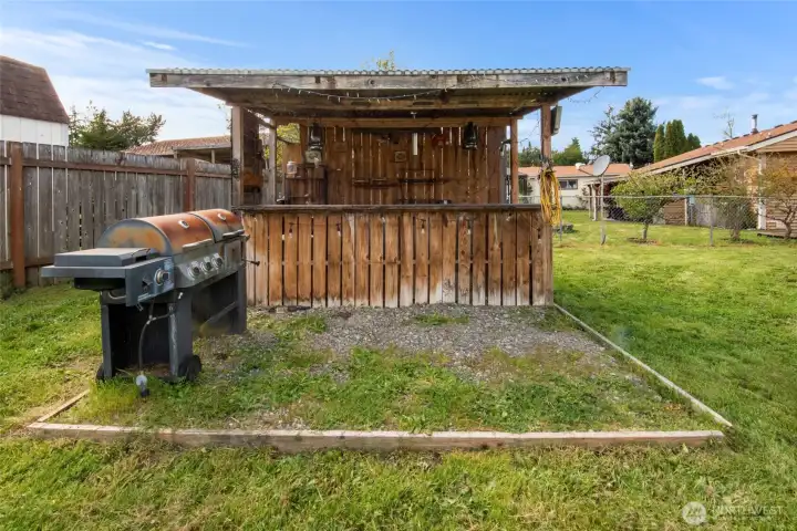 Tiki bar outside in the backyard