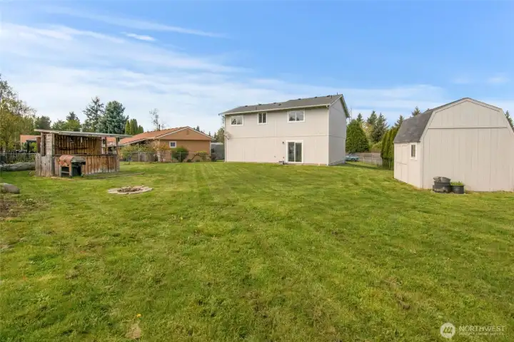 View of back of home and Tuff shed from corner of the lot