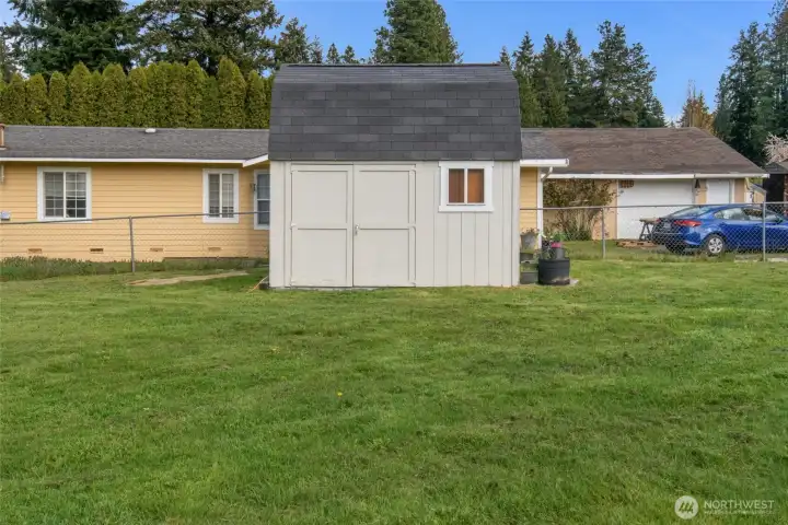 Newly painted Tuff Shed to match the exterior of the home