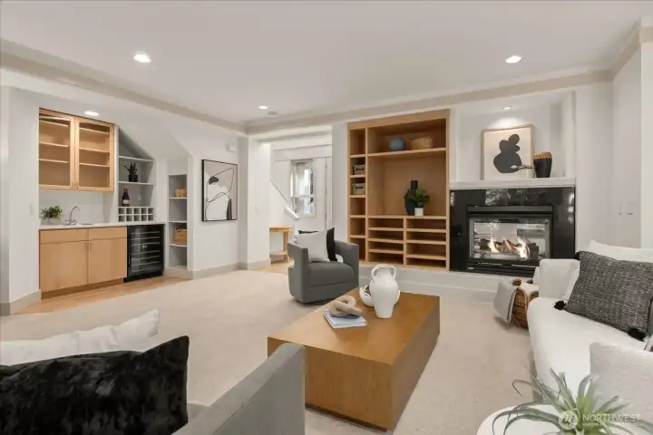 Open-concept great room with fresh interior paint (2026), updated lighting, and seamless flow between living and entertaining spaces.
