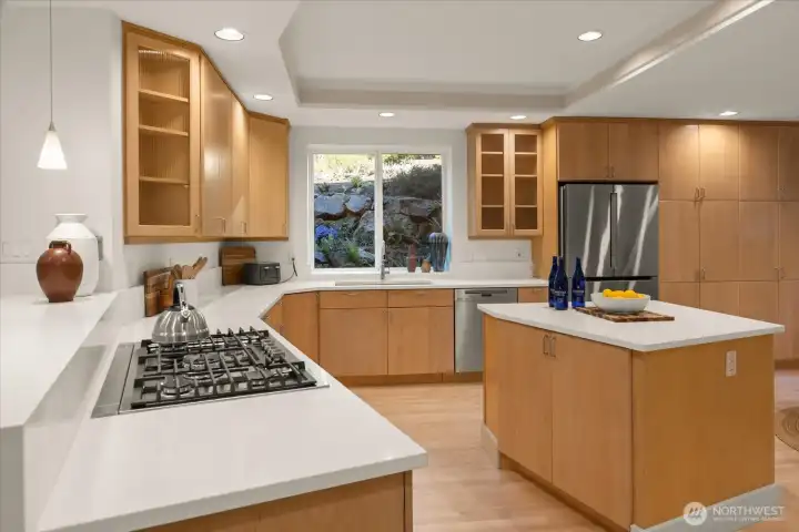 Beautifully updated kitchen featuring new quartz countertops (2026), premium Bosch appliances, and clean, modern finishes.