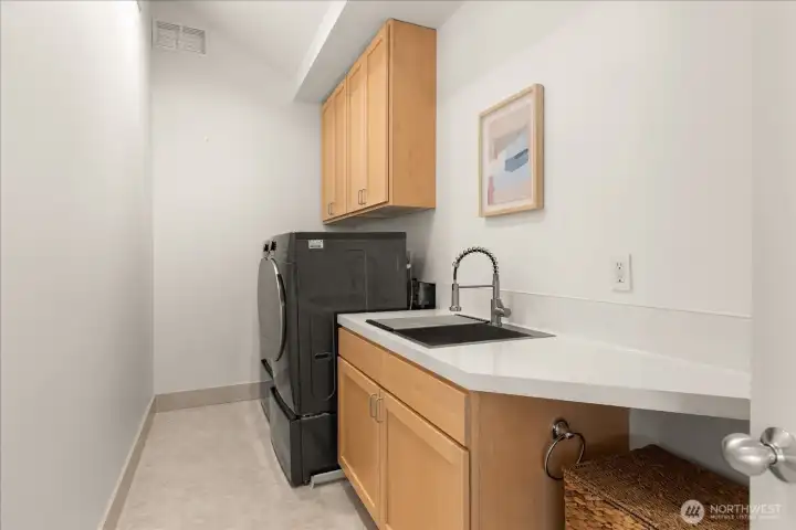 Convenient upstairs laundry room with new LG washer and dryer (Dec 2025), ideally located near the bedrooms for everyday ease.