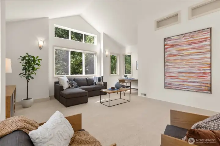 Light-filled bonus room offering flexible space for media, office, or play.