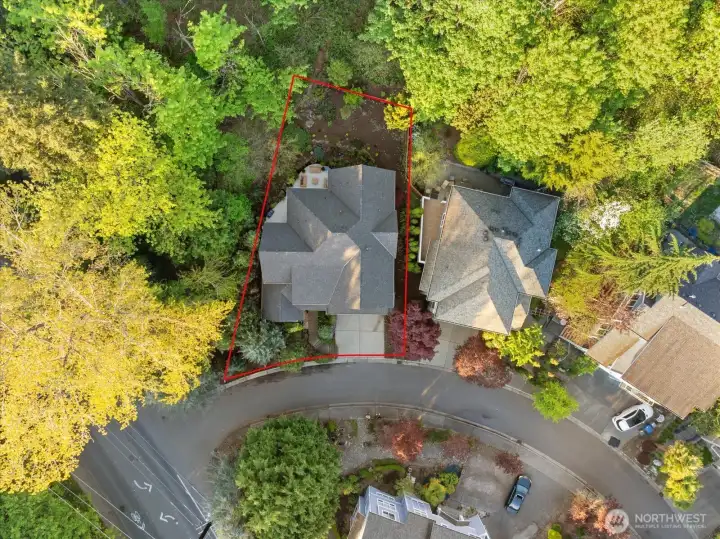 Distinctive setting on a quiet cul-de-sac with clearly defined lot boundaries and a private, tucked-away feel.