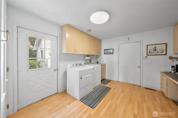 Laundry room, mud room is huge