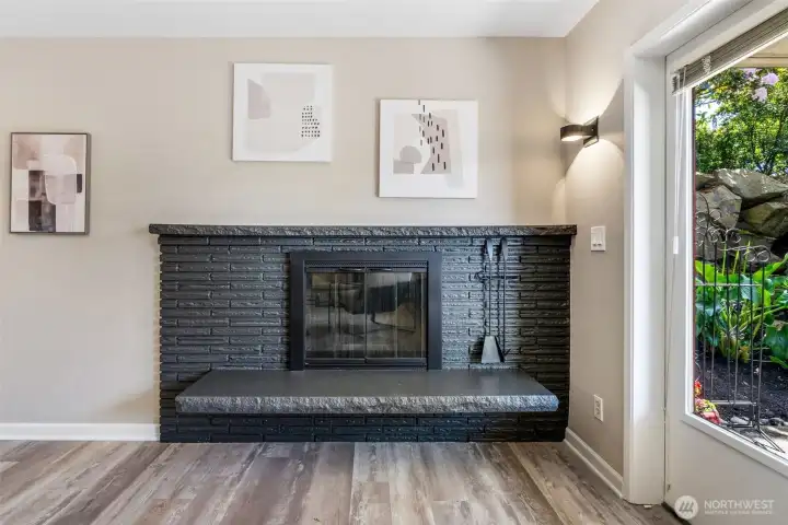 Sleek Woodburning fireplace & a great hearth