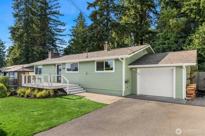 A level driveway greets you with an attached one-car garage. A level driveway greets you with an attached one-car garage.