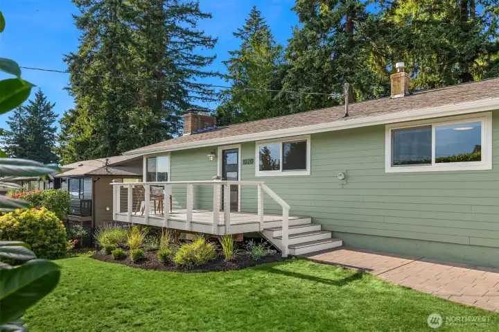 Inviting front entry with front porch that overlooks water views of Liberty Bay. Inviting front entry with front porch that overlooks water views of Liberty Bay.