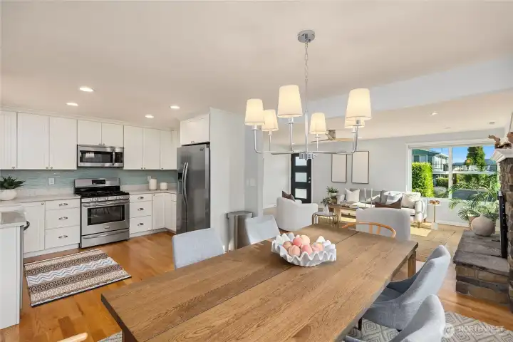 Kitchen opens directly to the dining and living areas for a bright, connected floor plan. Kitchen opens directly to the dining and living areas for a bright, connected floor plan.