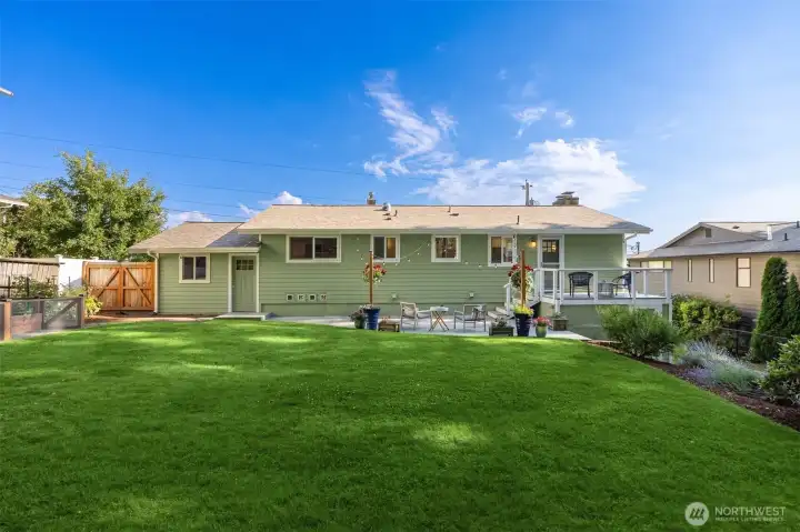 Raised garden beds include drip irrigation, with a sprinkler system installed in both the front and back yard. Raised garden beds include drip irrigation, with a sprinkler system installed in both the front and back yard.