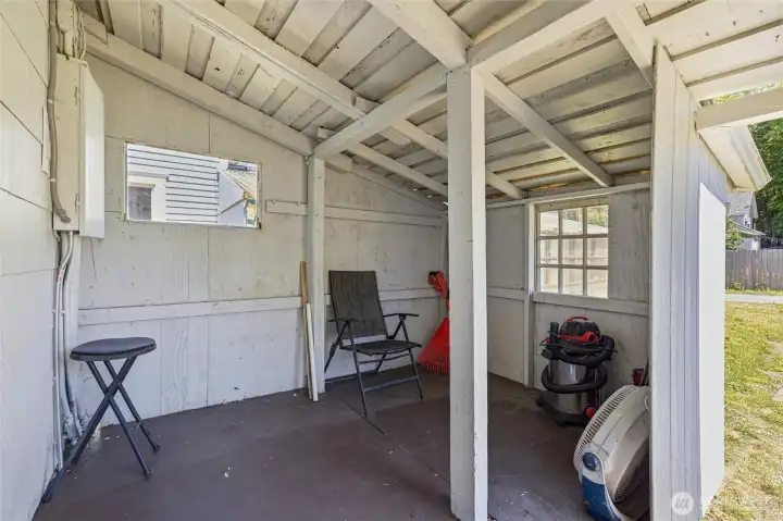 The covered back porch, with substantial storage. The covered back porch, with substantial storage.