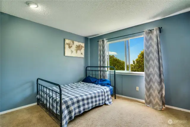 This second upstairs bedroom offers a nice view of the working waterway by day and Tacoma lights at night.