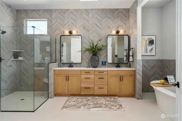 Luxurious Primary Bath with Full Wall Tile over vanity