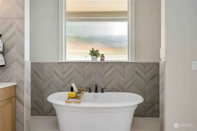 Free Standing Ella Soaker Tub and Tile wainscoting