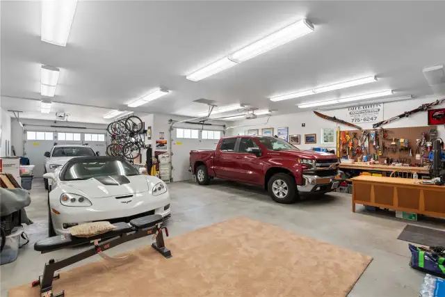 View of 1,204 sf 3-car garage with room for boat storage, work area and recreational toys.