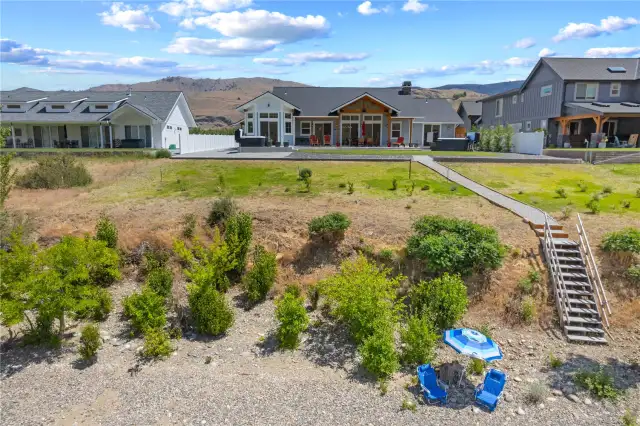 Aerial view 1 of home and waterfront.