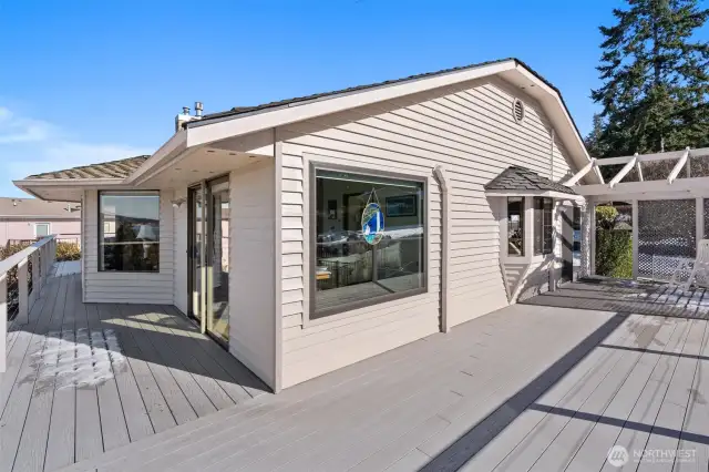 Expansive AZEK plank deck with views. Home has Cedar siding. Ample sunshine Winter & Summer!