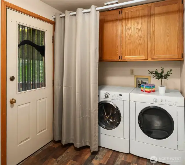 Mud/Laundry room off of back door, leading to the full bath & kitchen...