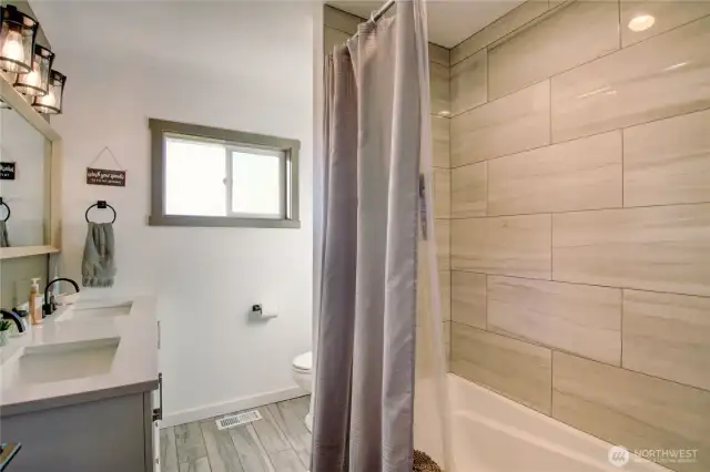 Bathroom with lovely tile.