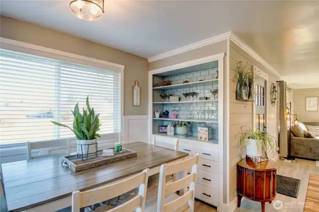 Classic built-in have been customized with tile accents creating a beautiful showcase and coffee bar.