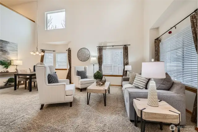 Step into the  light filled living room with dining space.