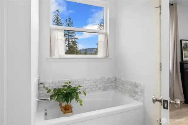 Soaking tub in the Primary bathroom.
