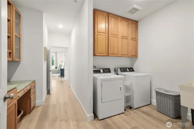 Laundry room/ mud room off the garage with plenty of built in storage.