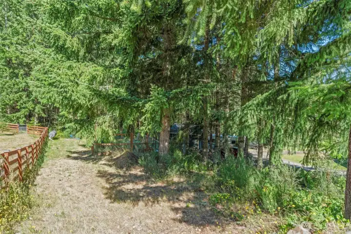 There is a garden space with deer proof fencing!!