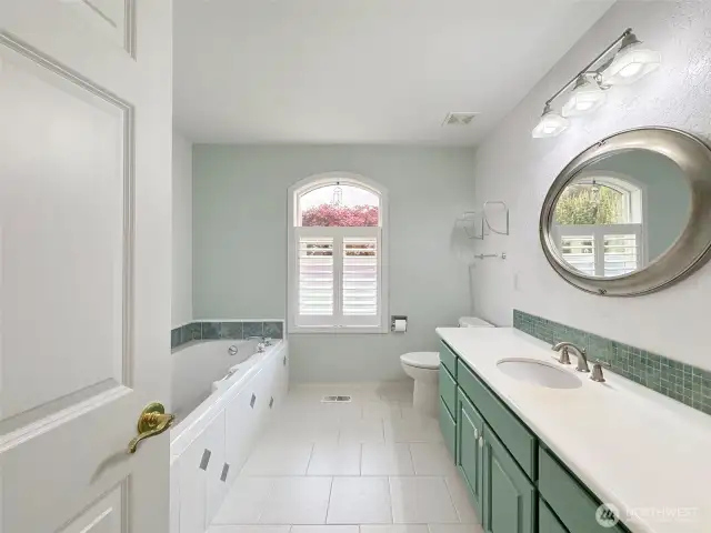 Primary bath with heated tile floors.