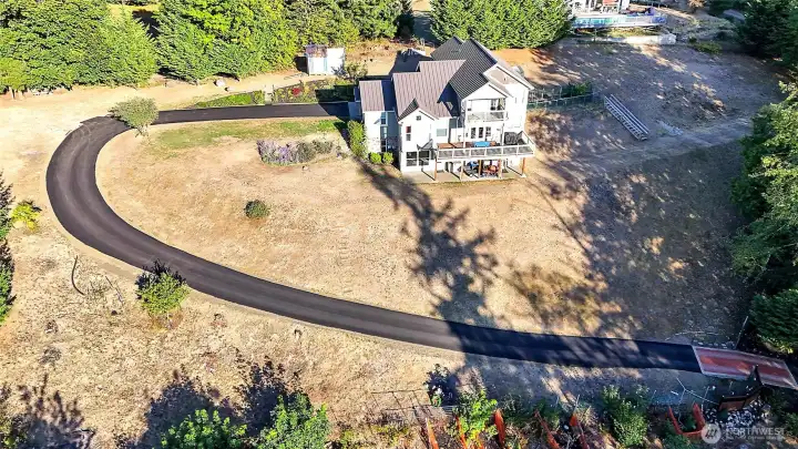 The newly installed paved driveway takes you one of the most spectacular views of the Olympic Mountains you will find anywhere.