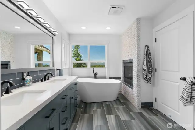Sitting in the tub you enjoy a cozy fire and incredible views. How cool is that?