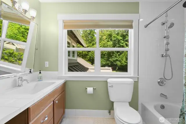 The large upstairs guest bath, it is squeaky clean.