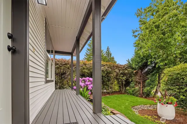 Cute covered porch and nice landscaping make this home turn key and quaint