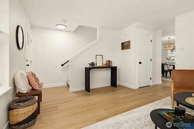 Nice open living room with trendy wide plank LVP