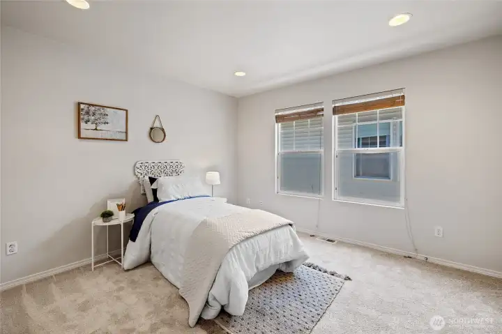 one of 3 additional bedrooms, all with walk in closets