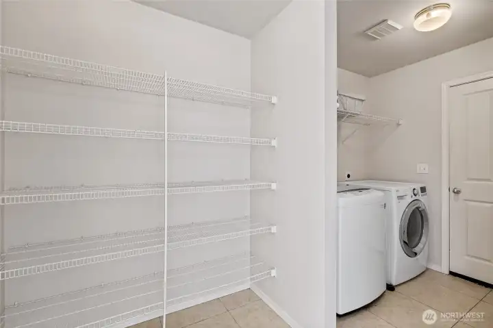 Laundry and pantry area off of kitchen