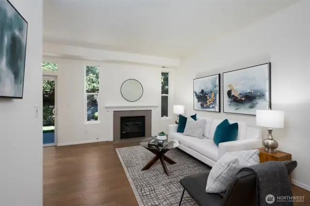 Upon entering your new townhome cozy up in your living room next to your gas fire place.
