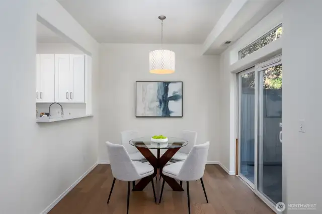 Dining room has a pleasant view of the patio and backyard.